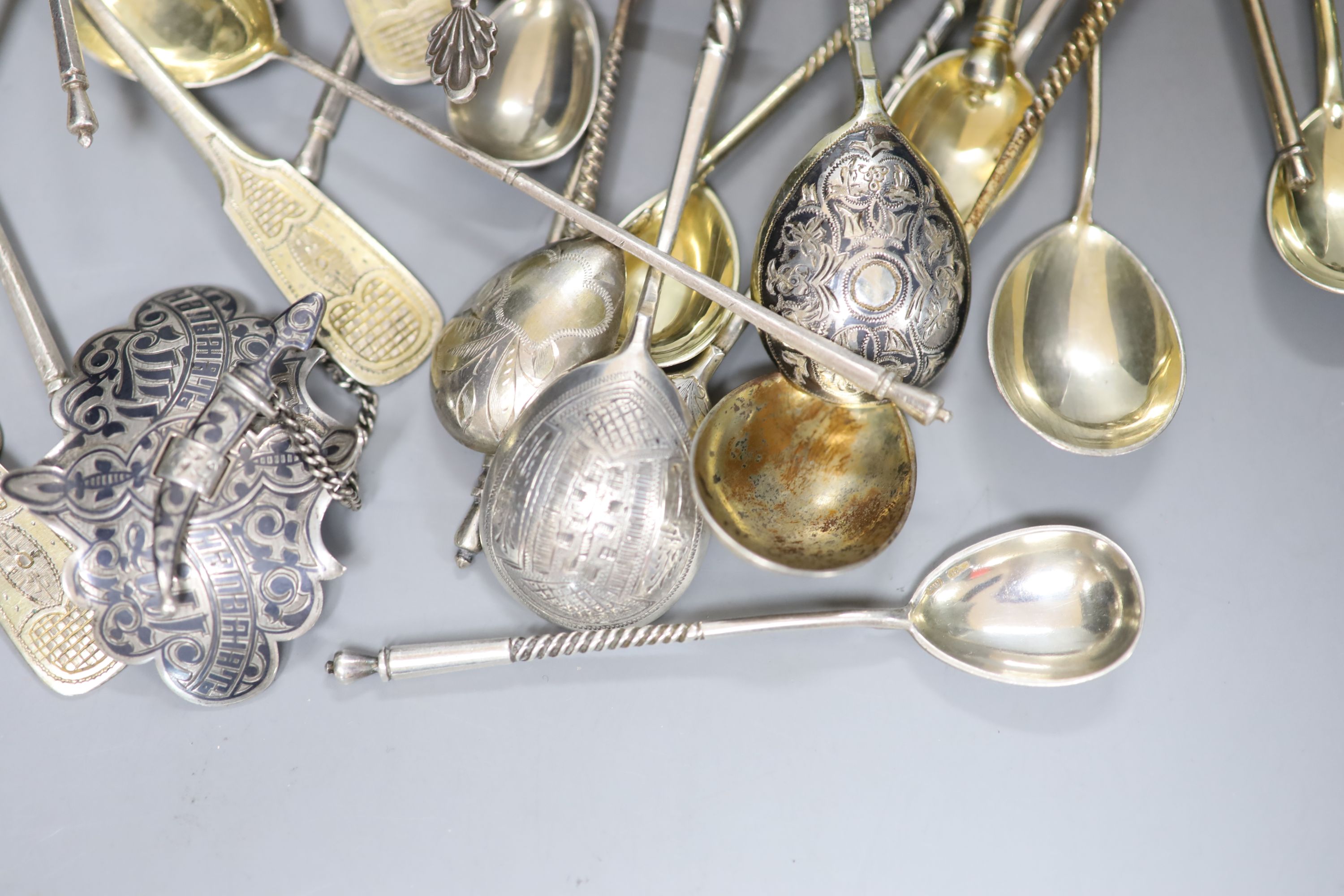 A late 19th century Russian 84 zolotnik and niello belt buckle and a quantity of assorted Russian 84 zolotnik teaspoons etc.